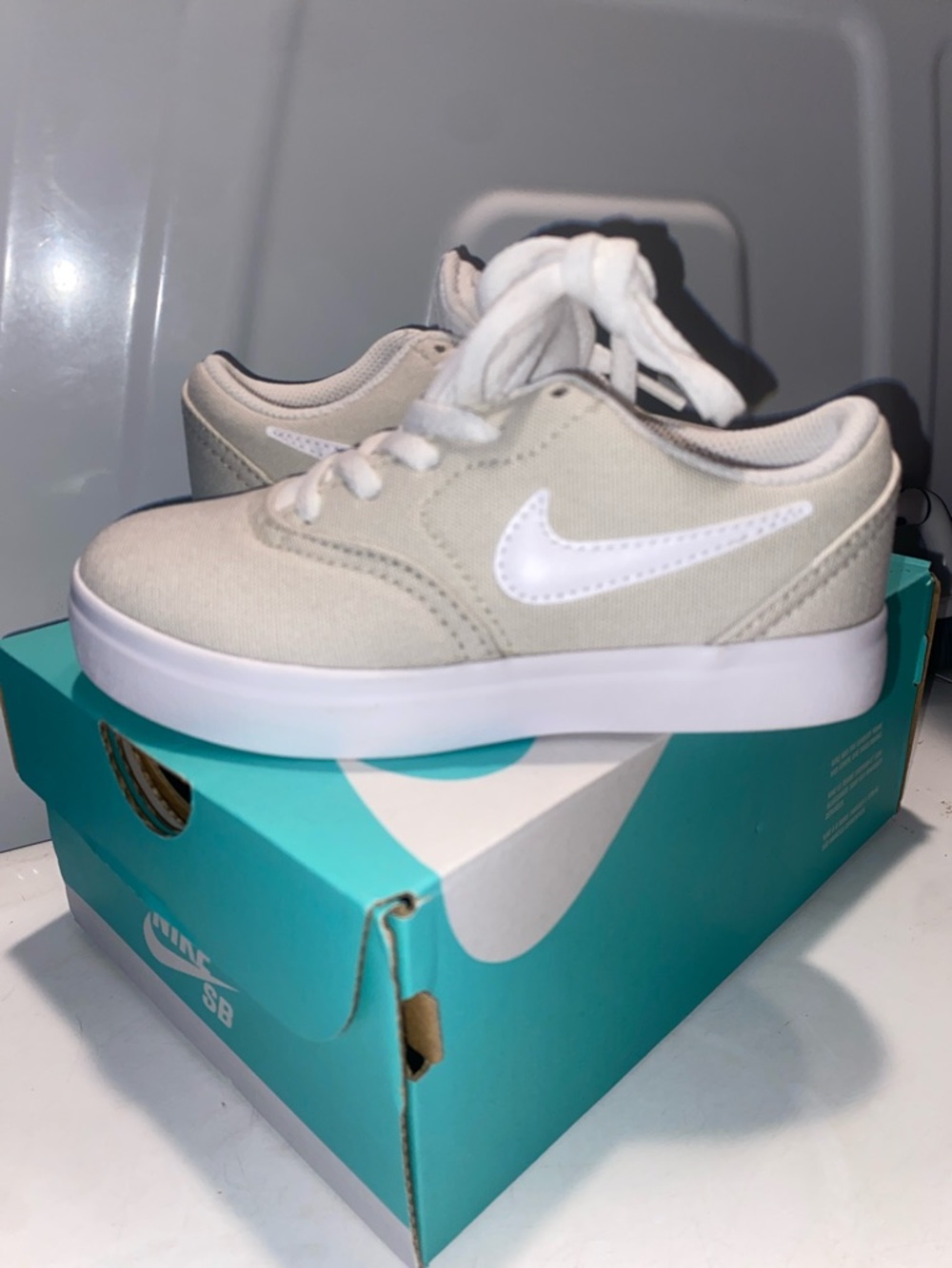Nike Low-Top Canvas Sneakers in Light Beige with White Swoosh Kids 11 kids